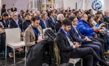 Professional audience attending a conference on payment & the European wallet at TRUSTECH 2024, with a large number of focused participants.