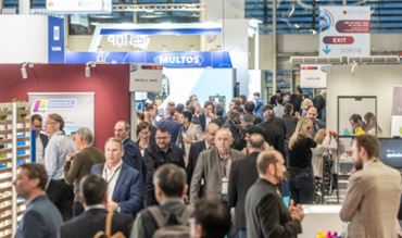 Busy aisles at TRUSTECH 2025, where global leaders in digital identity, security, and payment solutions showcase their latest innovations.