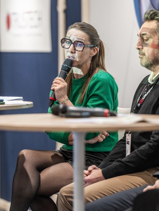 Charlotte PEUTIN presenting during the TRUSTECH 2025 conference on Artificial Intelligence & agentic commerce
