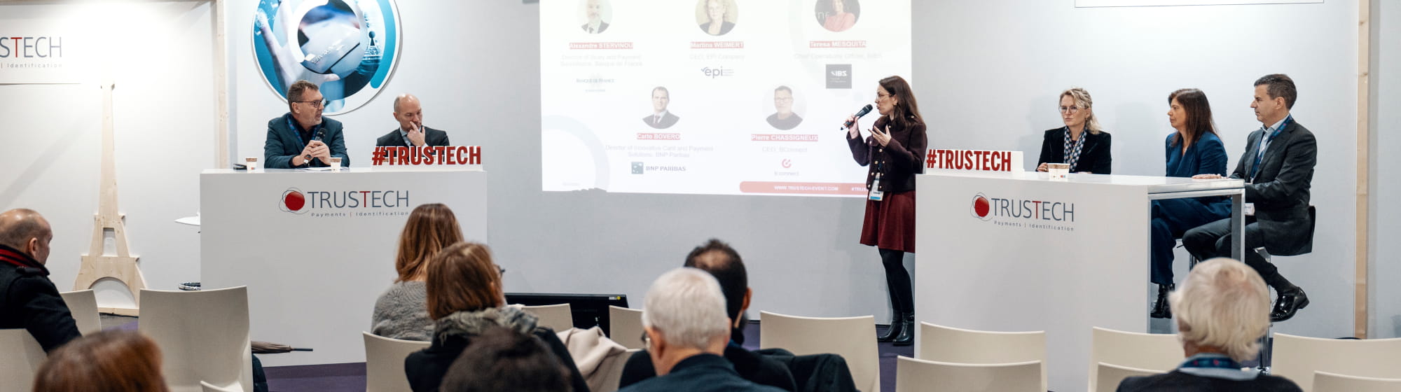People attending a round table on Sovereignty regarding Europe of payments with 6 speakers in the TRUSTECH conference room