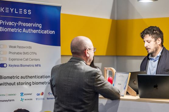 Stand of a TRUSTECH Innovation Awards Winner with the Trophy on the desk