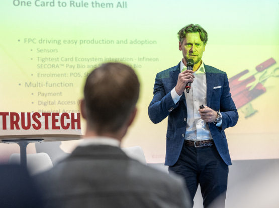 Speaker at TRUSTECH 2025 presenting payment card solutions and digital identity innovation