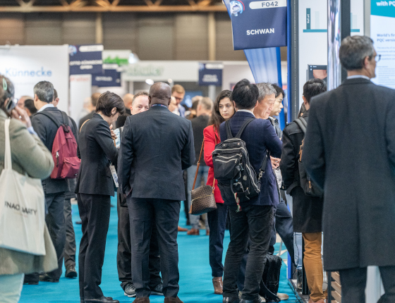Visitors in the aisles of TRUSTECH