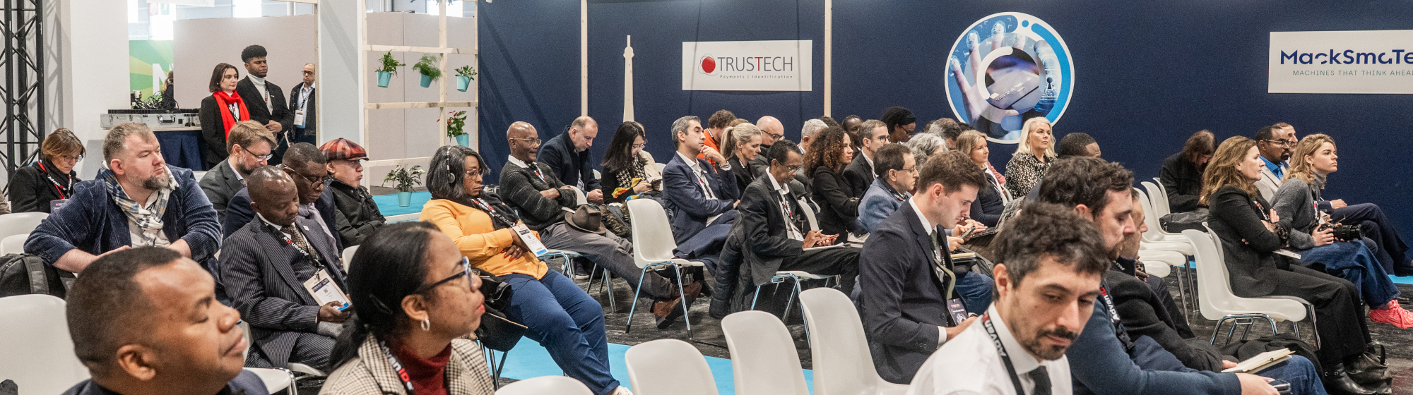 Attendees listening to a conference on trusted technologies and digital identity at TRUSTECH